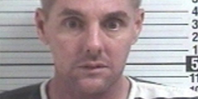 Kevin Robert Holroyd, 49, engaged in a shootout with police on Tuesday, firing hundreds of rounds, police said. He is believed to be responsible for a homicide in Walton County.