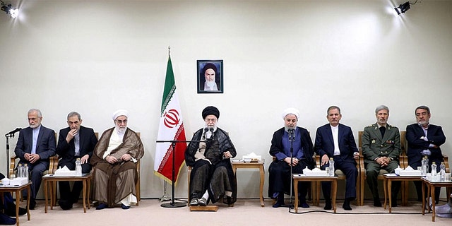 Iranian President Hassan Rouhani and his cabinet meet the Supreme Leader Ayatollah Ali Khamenei in Tehran.