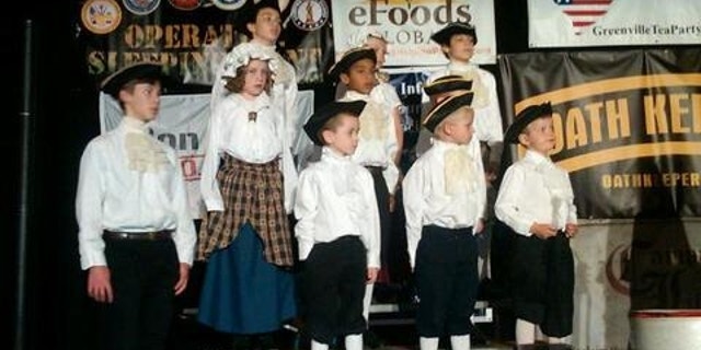 Children in period costume sing patriotic songs at the Greenville Tea Party "Freedom Rally." (Fox News Photo)