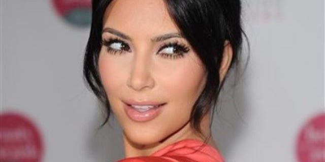 May 21: Kim Kardashian attends the 16th Annual Cosmetic Executive Women Beauty Awards at the Waldorf-Astoria in New York.