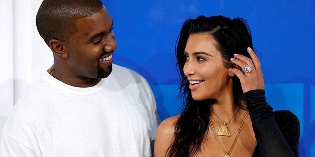 Paul McCartney said Kanye West would look at photos of Kim Kardashian while writing songs.
