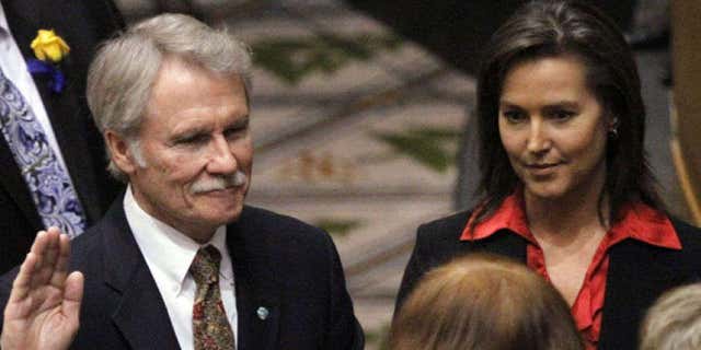 Jan. 10, 2011: Oregon Gov. John Kitzhaber, Democrat, is sworn in with financee Cylvia Hayes at his side. Salem, Oregon.