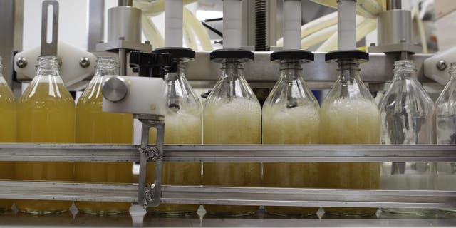 Regulators and retailers are concerned that kombucha may need to be regulated as an alcoholic drink. (AP Photo/Charles Krupa)