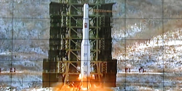 FILE - In this Dec. 12, 2012 file photo, a screen at the General Satellite Control and Command Center in Pyongyang, North Korea shows the moment an Unha-3 rocket is launched. (AP Photo/File)