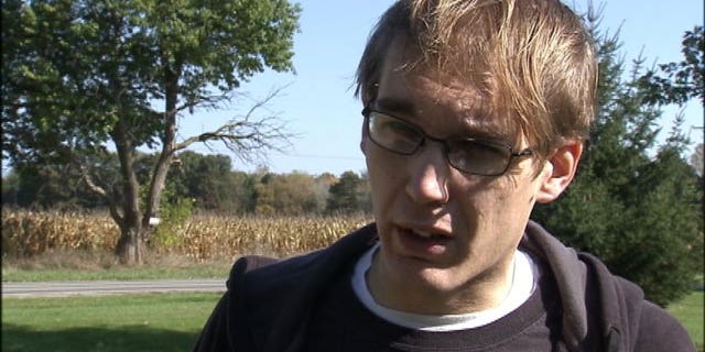 This undated photo shows Kristopher Oswald who said he was fired after helping a woman being attacked in a Walmart parking lot.