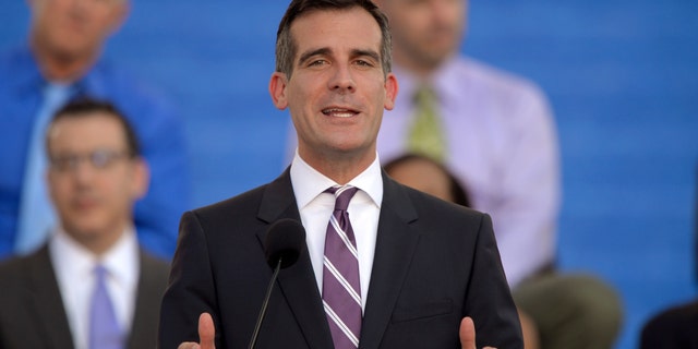 Los Angeles Mayor Eric Garcetti speaks in front of city hall after being sworn in, Sunday, June 30, 2013, in Los Angeles. (AP Photo/Mark J. Terrill)
