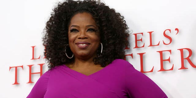 August 12, 2013: Oprah Winfrey arrives at the Los Angeles premiere of "Lee Daniels' The Butler" at the Regal Cinemas L.A. Live Stadium 14. (Photo by Matt Sayles)