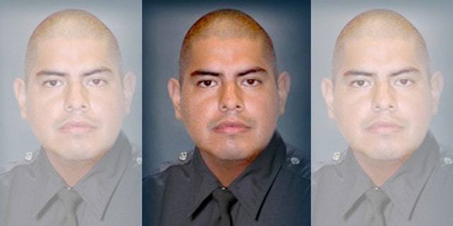 This image provided by the Los Angeles Police Department shows Officer Roberto C. Sanchez, who died Saturday May 3, 2014, at a Los Angeles hospital after the patrol car he was driving was broadsided by an SUV in the Harbor City area. The squad car was so mangled that Sanchez's partner had to call for help on his personal cellphone because the police radio wasn't working. (AP Photo/LAPD)