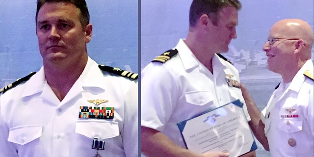 U.S. Navy pilot Lt. Cmdr. Mike “MOB” Tremel, left, received the Distinguished Flying Cross for shooting down a Syrian jet in 2017 — the first air-to-air kill for the U.S. military in 18 years. The award was presented by the head of naval aviation, Vice Admiral DeWolfe Miller III, right, over the weekend. (U.S. Naval Air Force)
