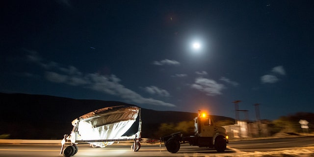 NASA’s Low Density Supersonic Decelerator (LDSD) test vehicle is rolled out to the launch pad under moon light, Wednesday, June 3, 2015, at the U.S. Navy Pacific Missile Range Facility (PMRF) in Kauai, Hawaii.