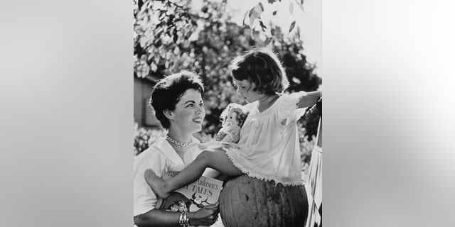 Shirley Temple with her daughter, Lori, in Atherton, California, in 1957.