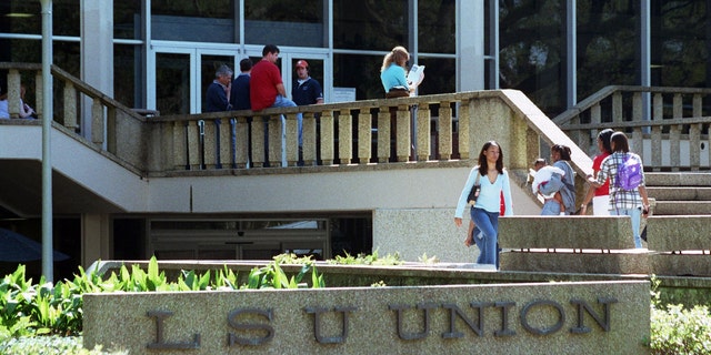 Students walk outside at Louisiana State University in Baton Rouge, Louisiana.