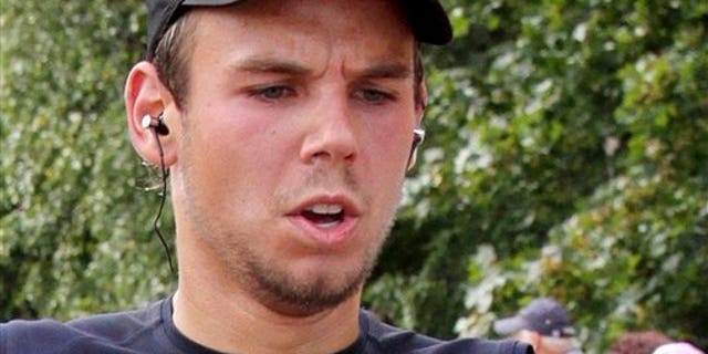 In this Sept. 13, 2009, photo, Germanwings co-pilot Andreas Lubitz competes at the Airportrun in Hamburg, northern Germany. (AP Photo/Michael Mueller)