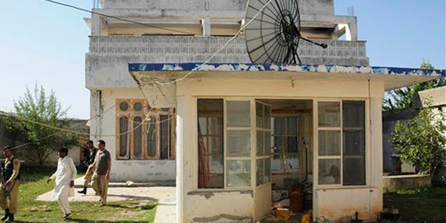 FILE - This photo shows the guesthouse inside Usama bin Laden's compound in Abbottabad, Pakistan.