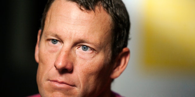 Feb. 15, 2011: In this file photo, Lance Armstrong pauses during an interview in Austin, Texas.