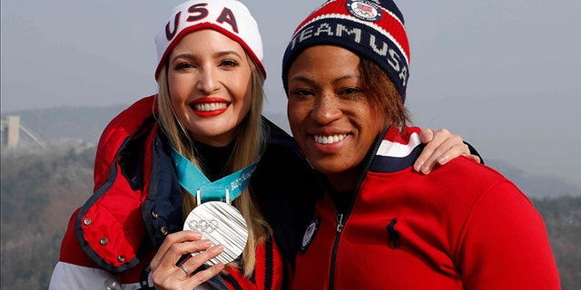 U.S Olympic silver medalist Lauren Gibbs allowed Ivanka Trump to wear her medal for a photo.