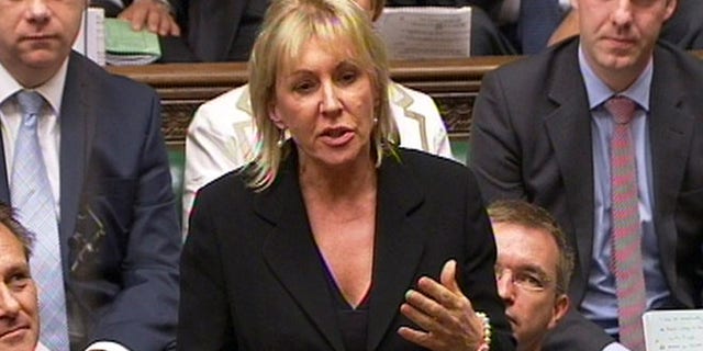 In this photo made from video on Sept. 5, 2012, Conservative MP Nadine Dorries talks during Parliament, in London.