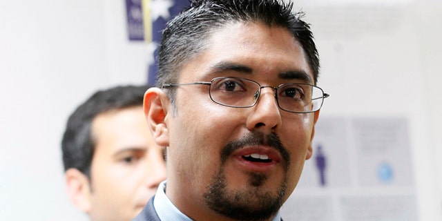 File - In this Aug. 27, 2013 file photo, Sergio Garcia speaks at The Coalition for Humane Immigrant Rights of Los Angeles news conference in Los Angeles. The California Supreme Court granted a law license on Thursday, Jan. 2, 2014, to Garcia, who is living in the United States illegally. Garcia, who graduated from law school and passed the state bar exam, can begin practicing law despite his immigration status. He arrived in the U.S. illegally 20 years ago to pick almonds with his father. (AP Photo/Nick Ut, File)