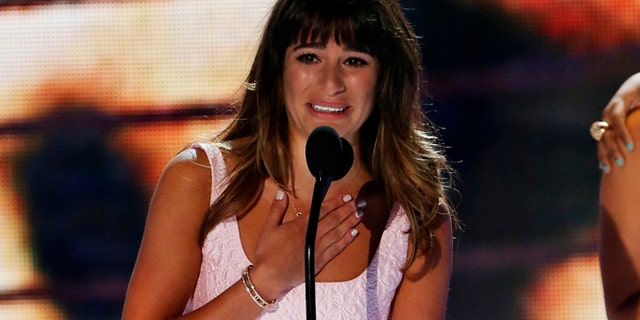 Actress Lea Michele accepts the Choice TV Actress: Comedy Award at the Teen Choice Awards at the Gibson amphitheatre in Universal City, California August 11, 2013.