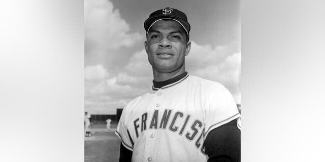 In this March 8, 1962 file photo Felipe Alou, outfielder for the San Francisco Giants, poses in Casa Grande, Ariz. Alou and Orlando Cepeda were dark-skinned Latinos who knew little English when they arrived in the minor leagues as teenagers, among the first wave of Spanish-speaking players thrown into a new culture to play professional baseball. Both are encouraged to see so many young players from Latin America now arriving in the U.S. with better English skills, thanks in large part to all 30 major league organizations putting more emphasis into such training through academies in the Dominican Republic and Venezuela. (AP Photo/File)