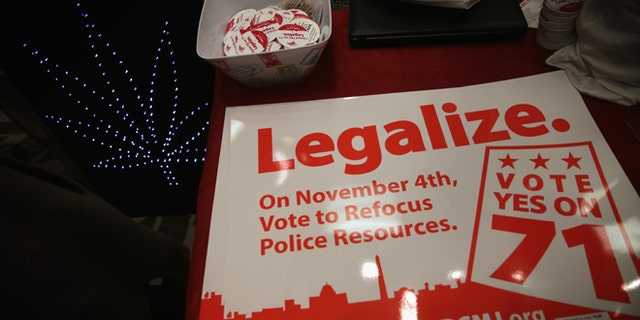 WASHINGTON, DC - FEBRUARY 28:  Posters and stickers regarding Washington, DC's marijuana legalization are seen during a ComfyTree Cannabis Academy conference February 28, 2015 in Washington, DC. Attendees participated in the conference to gain knowledge on how to legally enter and operate in the cannabis industry.  (Photo by Alex Wong/Getty Images)