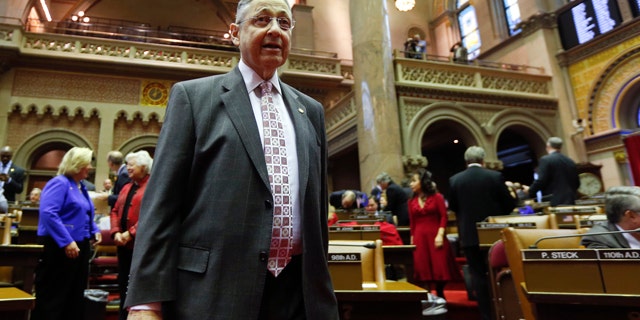 Jan. 7, 2015: Assembly Speaker Sheldon Silver, D-Manhattan, walks on the floor in the Assembly Chamber at the start of the 2015 legislative session at the state Capitol in Albany, N.Y. (AP Photo/Mike Groll)