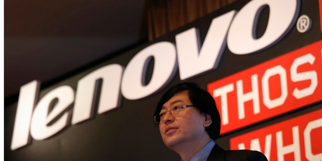 Lenovo Chairman and Chief Executive Officer Yang Yuanqing speaks during a news conference announcing the company's annual results in Hong Kong May 21, 2014.