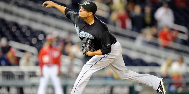 Leo Nunez (now known by his real name Juan Carlos Oviedo) #46 of the Florida Marlins pitches against the Washington Nationals at Nationals Park on September 17, 2011 in Washington, DC.