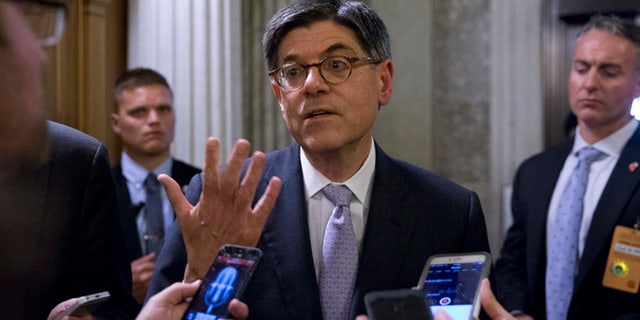 Treasury Secretary Jacob Lew talks with reporters in Washington, Tuesday, June 21, 2016.