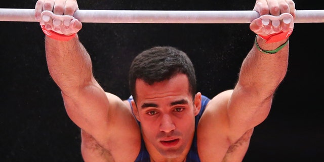 GLASGOW, SCOTLAND - OCTOBER 26: Danell Levya of United States competes on the High Bars during day four of World Artistic Gymnastics Championships at The SSE Hydro on October 26, 2015 in Glasgow, Scotland. (Photo by Ian MacNicol/Getty images)