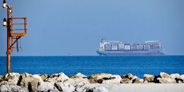 The Danish-flagged Alexander Maersk cargo ship off Sicily Monday, waiting to disembark 100 migrants it helped rescue Thursday in the Mediterranean Sea. (AP Photo/Salvatore Cavalli)