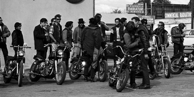 Hells Angels and locals outside the Blackboard Cafe in Bakersfield, Calif., 1965.