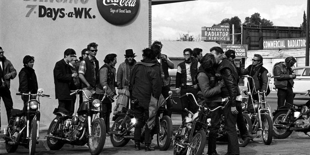 Hells Angels and locals outside the Blackboard Cafe in Bakersfield, Calif., 1965.