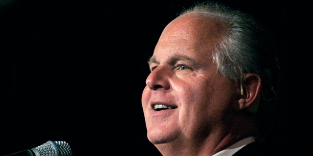 Radio talk show host and conservative commentator Rush Limbaugh speaks in Novi, Michigan. (Photo by Bill Pugliano/Getty Images)