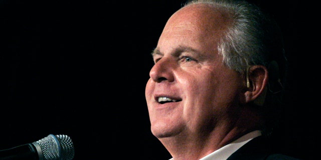 Radio talk show host and conservative commentator Rush Limbaugh speaks in Novi, Michigan. (Photo by Bill Pugliano/Getty Images)