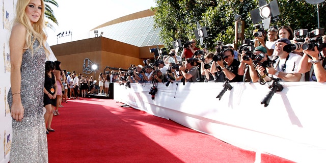 June 6: Lindsay Lohan arrives at the MTV Movie Awards in Universal City, Calif. (AP)