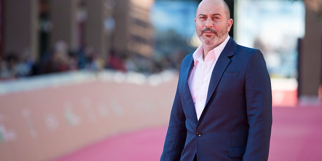 Actor Lior Raz poses for photographers as he arrives for the screening of the movie Fauda at Rome's Film Festival, in Rome, Saturday, Oct. 17, 2015. (AP Photo/Andrew Medichini)