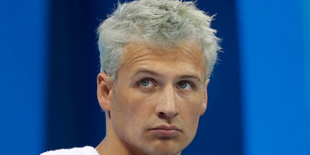United States' Ryan Lochte prepares before a men's 4x200-meter freestyle heat during the swimming competitions at the 2016 Summer Olympics, Tuesday, Aug. 9, 2016, in Rio de Janeiro, Brazil. (AP Photo/Michael Sohn)
