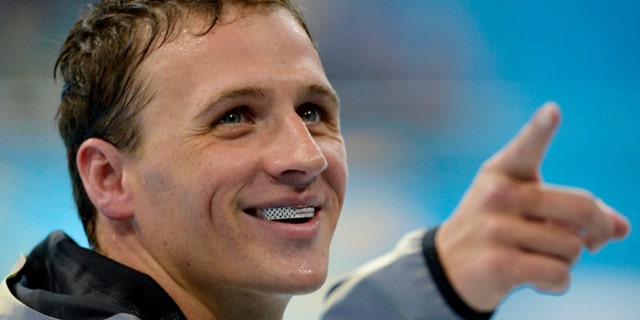 Aug. 2, 2012: United States' Ryan Lochte gestures after receiving his silver medal for the men's 200-meter individual medley swimming final at the Aquatics Centre in the Olympic Park during the 2012 Summer Olympics in London.