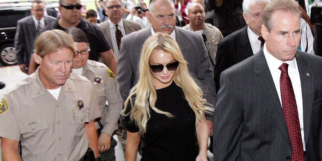 July 6: Lindsay Lohan arrives for a probation hearing in Los Angeles.