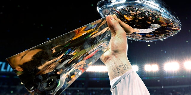 Feb. 2, 2014: The Lombardi Trophy is raised during celebrations after the NFL Super Bowl XLVIII football game.