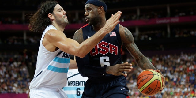 Aug. 10, 2012: United States' LeBron James, right, prepares to drive on Argentina's Luis Scola during a men's semifinals basketball game at the 2012 Summer Olympics in London.