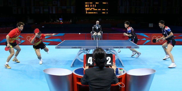 Aug. 8, 2012: Wang Hao and Zhang Jike of China, right, compete against Oh Sangeun and Ryu Seungmin of South Korea in the men's team table tennis gold medal match at the 2012 Summer Olympics in London.