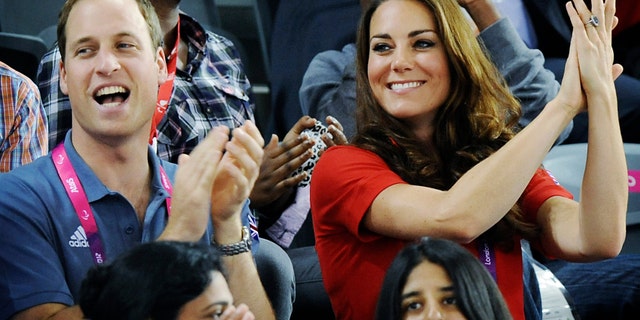 Britain's Prince William and his wife Kate Duchess of Cambridge watch British cyclist Sarah Storey break a world record in her C5 Individual Pursuit heat at the Paralympic Games in London. (AP Photo/Stefan Rousseau/Pool)
