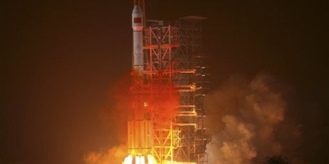 An orbiter is launched by a Long March-3 III carrier rocket from the Xichang Satellite Launch Center in southwest China's Sichuan Province, on Sunday Jan. 17, 2010. It was the third orbiter that China has launched for its independent satellite navigation and positioning network, also known as Beidou, or Compass system, Xinhua said.