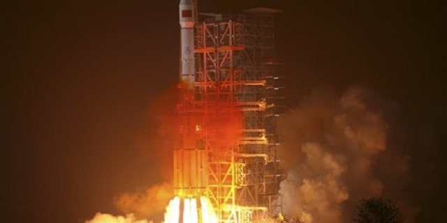 An orbiter is launched by a Long March-3 III carrier rocket from the Xichang Satellite Launch Center in southwest China's Sichuan Province, on Sunday Jan. 17, 2010. It was the third orbiter that China has launched for its independent satellite navigation and positioning network, also known as Beidou, or Compass system, Xinhua said.