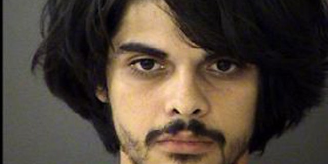 August 23, 2014: This booking photo shows 24-year-old Joshua Lopez, who is accused of fatally shooting Elmendorf, Texas police chief Michael Pimentel during a traffic stop. (Bexar County Sheriff's Office)