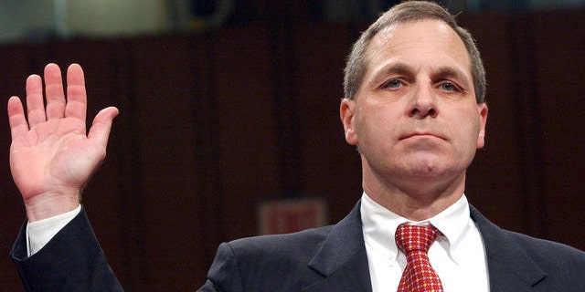 In this file photo, Louis Freeh, former FBI director, is sworn in at September 11th commission hearings on Capitol Hill in Washington DC.