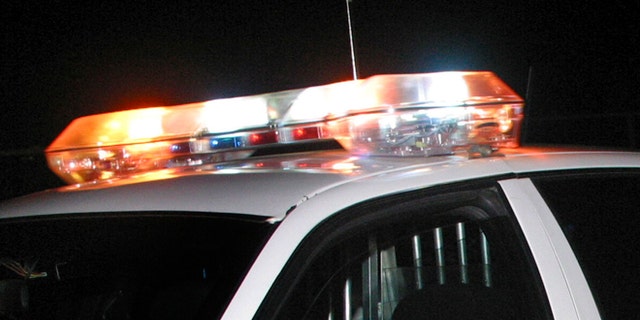 Police car with flashing lights in Shreveport, Louisiana. (Photo by Mario Villafuerte/Getty Images)