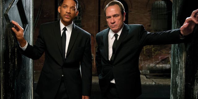 In this film image released by Sony Pictures, Tommy Lee Jones, right, and Will Smith star are shown in a scene from "Men in Black 3."